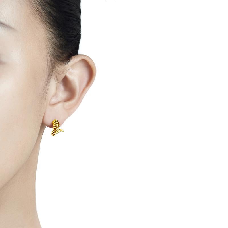 Danger Thorn Earrings in 18K Gold by Mistova. Handcrafted from the finest 18K gold. These earrings are easy to wear and suitable for everyday wear. A playful spiral design with segmented details on the surface.