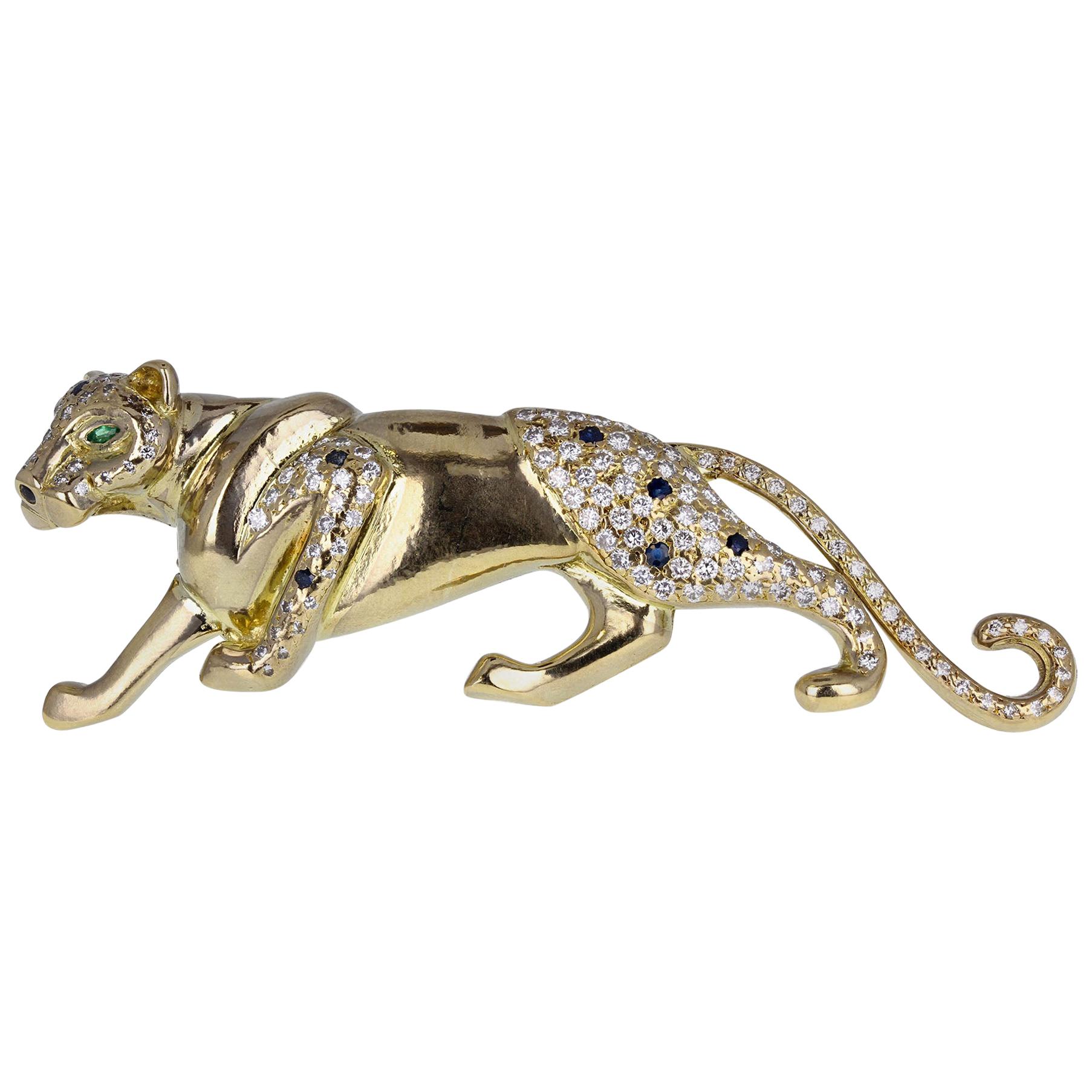 18 Carat Gold Diamond Sapphire Prowling Panther Brooch For Sale
