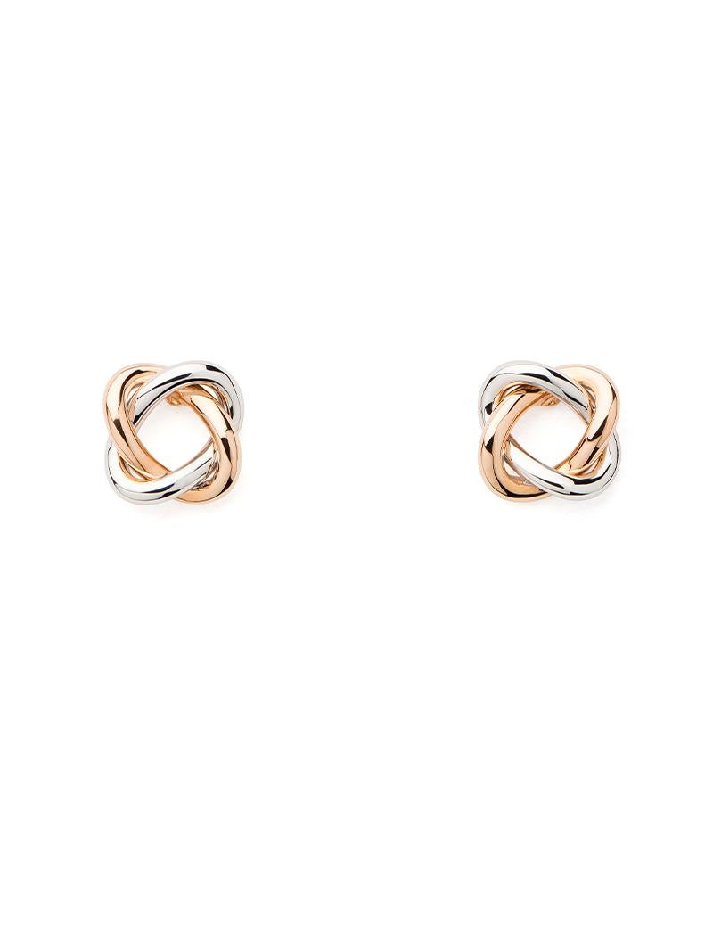 With its two delicately intertwined gold strands, the Tresse collection is inspired by the elegance of couture and symbolises the bond of love.

Tresse earrings in rose and white gold.

Pattern size: 9x9 mm
Average gold weight: 2.6 grams
Clasp: