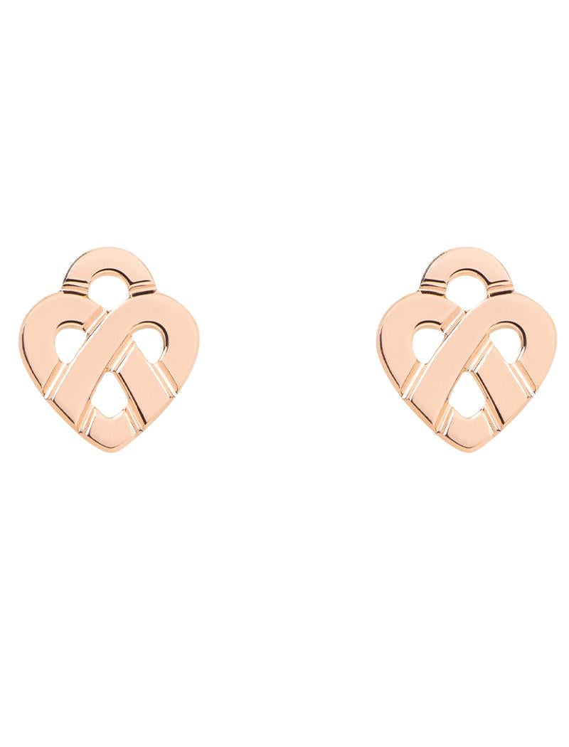The timeless Poiray collection, Coeur Entrelacé, reveals itself in pure lines, with generous curves, and is dressed in gold or diamonds to celebrate all loves.

Cœur Entrelacé earrings in rose gold.

Please note that the carat weight, number of