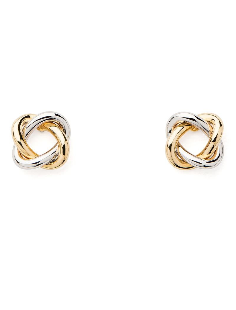 With its two delicately intertwined gold strands, the Tresse collection is inspired by the elegance of couture and symbolises the bond of love.

Tresse earrings in yellow and white gold.

Pattern size: 9x9 mm
Average gold weight: 2.7 grams
Clasp: