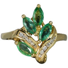18 Carat Gold Emerald and Diamond Cluster Ring