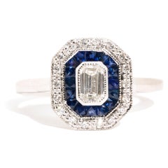18 Carat Gold Emerald Cut Diamond and Blue Sapphire Contemporary Cluster Ring
