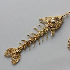 18 Carat Gold Fish Bone Pendant and Knot Chain