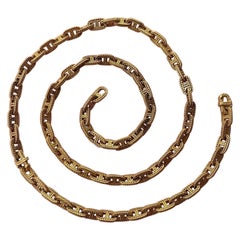 18 carat gold Hermès chaine d’ancre tressee bracelet and chain