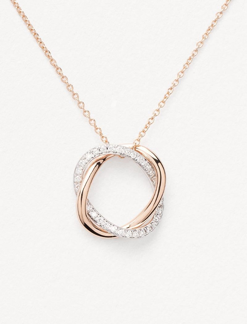 With its two strands of gold delicately intertwined, the Tresse collection is inspired by the elegance of couture and symbolises the bond of love.

Tresse necklace in rose and white gold paved with diamonds.

Pattern size: 14x14 mm
Stone: diamond -