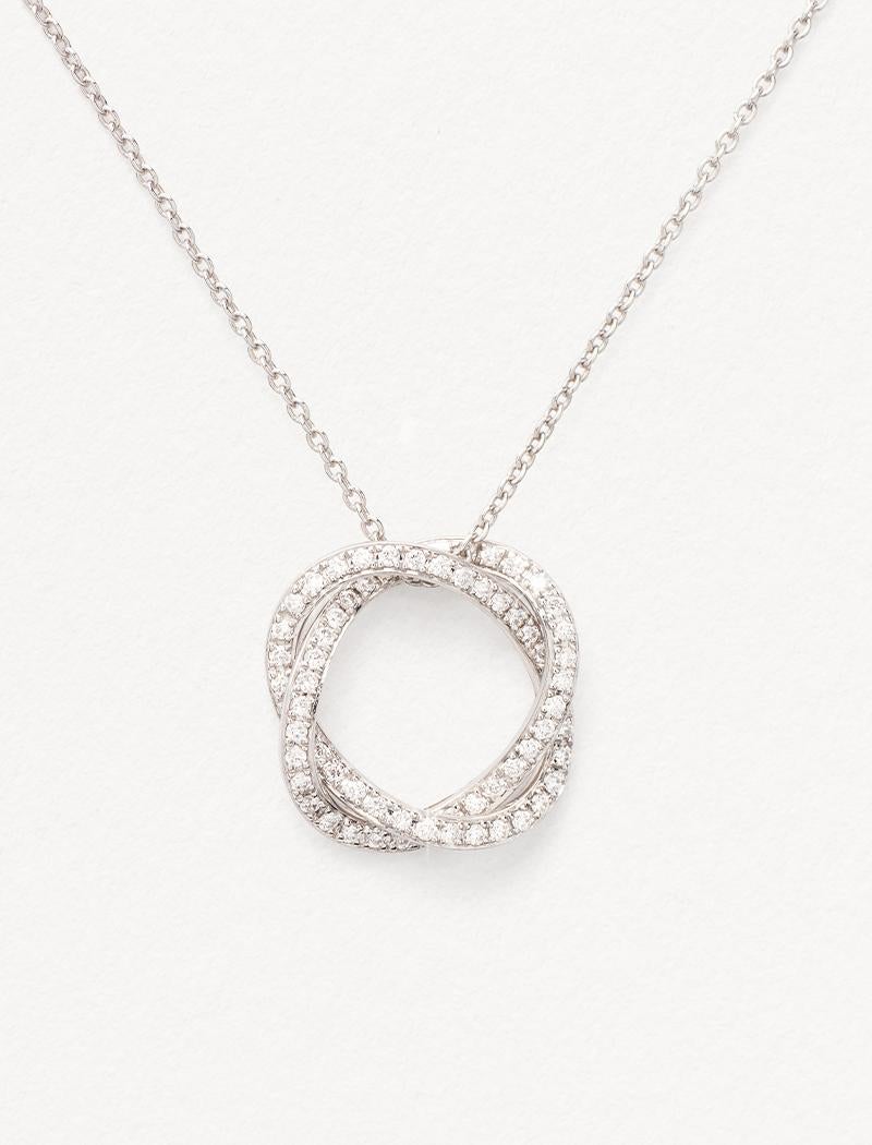 With its two delicately intertwined strands of gold, the Tresse collection is inspired by the elegance of couture and symbolises the bond of love.

Tresse necklace in diamond-paved white gold.

Pattern size: 14x14 mm
Stone: diamond - 0.20 carat -