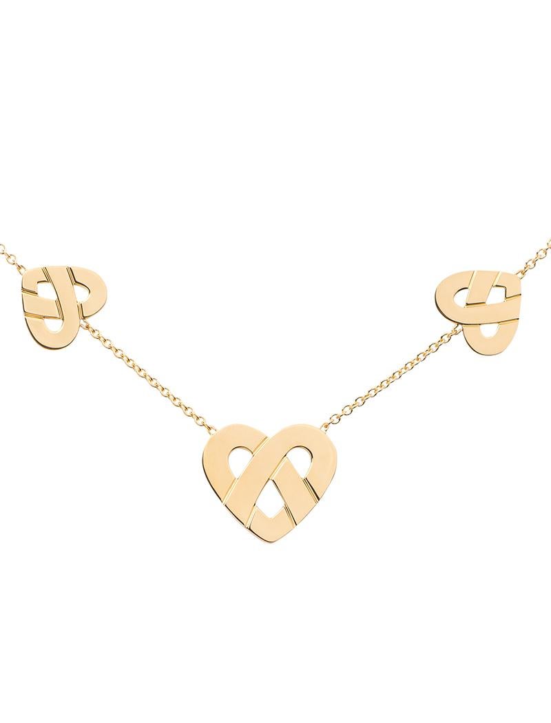 The timeless Poiray collection Cœur Entrelacé is revealed in pure lines, with generous curves, and is dressed in gold or diamonds to celebrate all loves.

Interlaced heart necklace with three hearts on a yellow gold chain.

Please note that the
