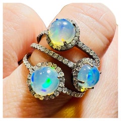 18 Carat Gold Opal And Diamond Ring