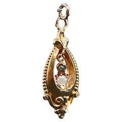 18-carat gold openwork pendant with pearls