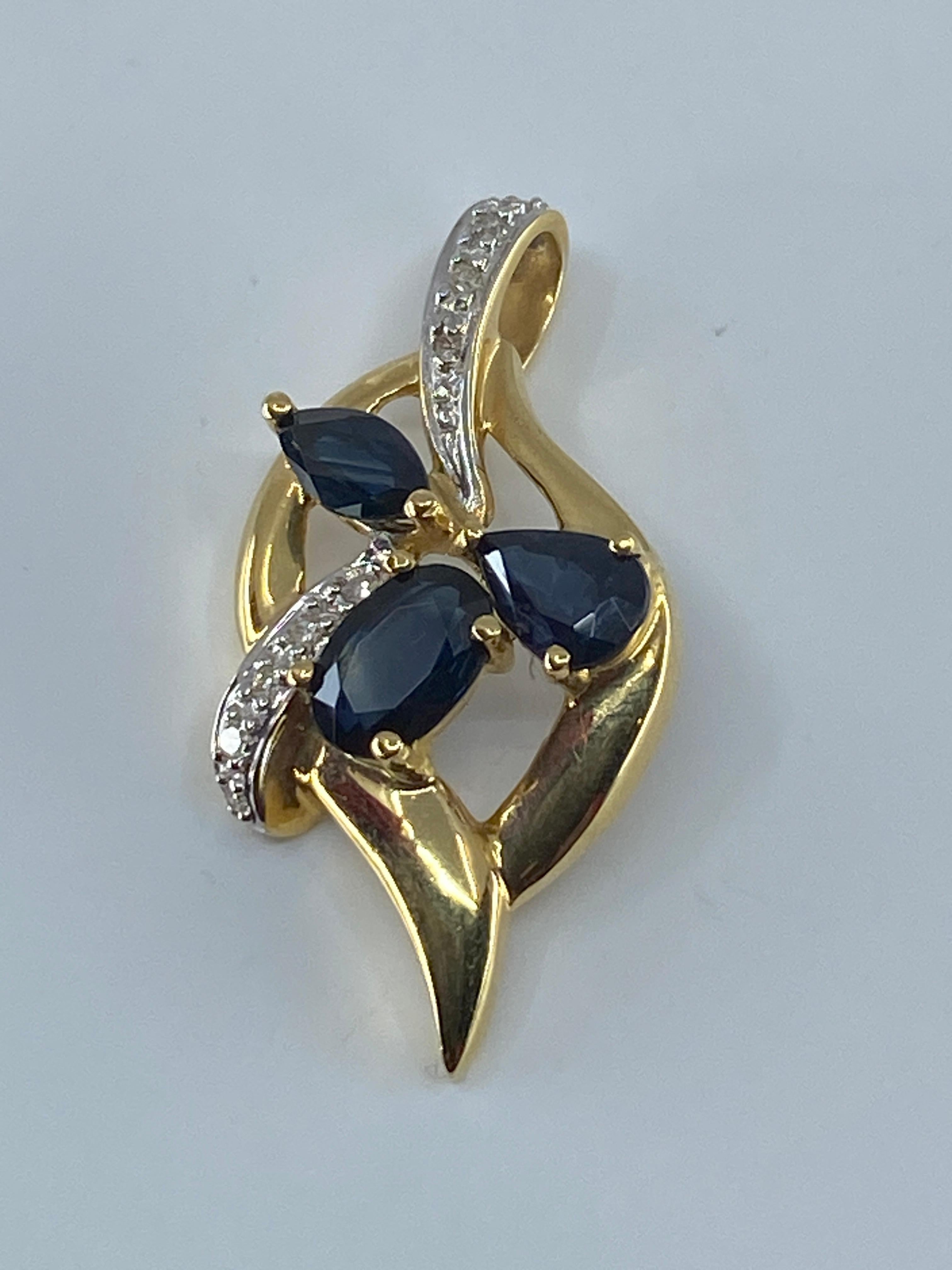 18 Carat Gold Pendant Set with 3 Pear, Shaped Sapphires and 14 Diamonds For Sale 5