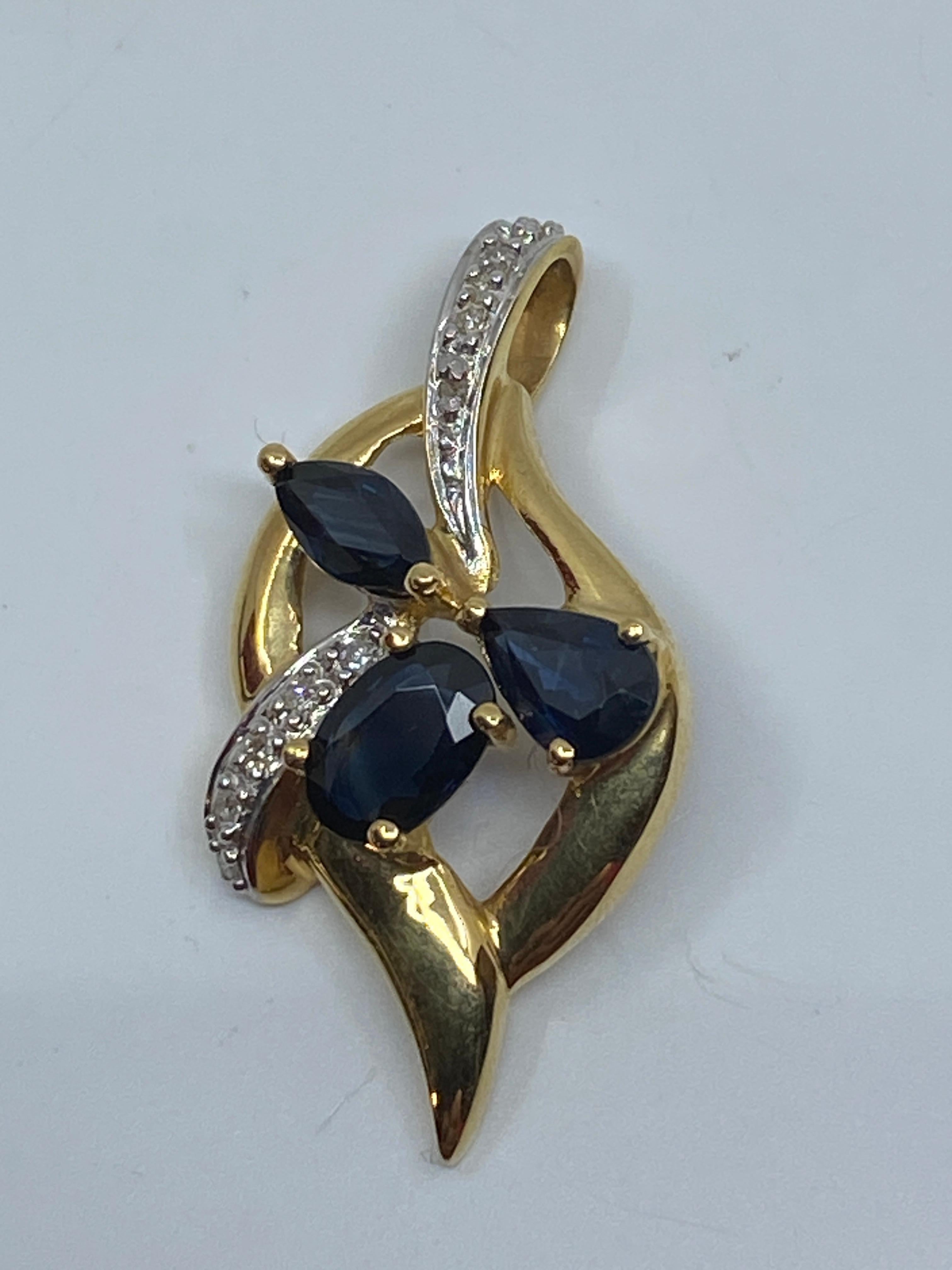 18 Carat Gold Pendant Set with 3 Pear, Shaped Sapphires and 14 Diamonds For Sale 6