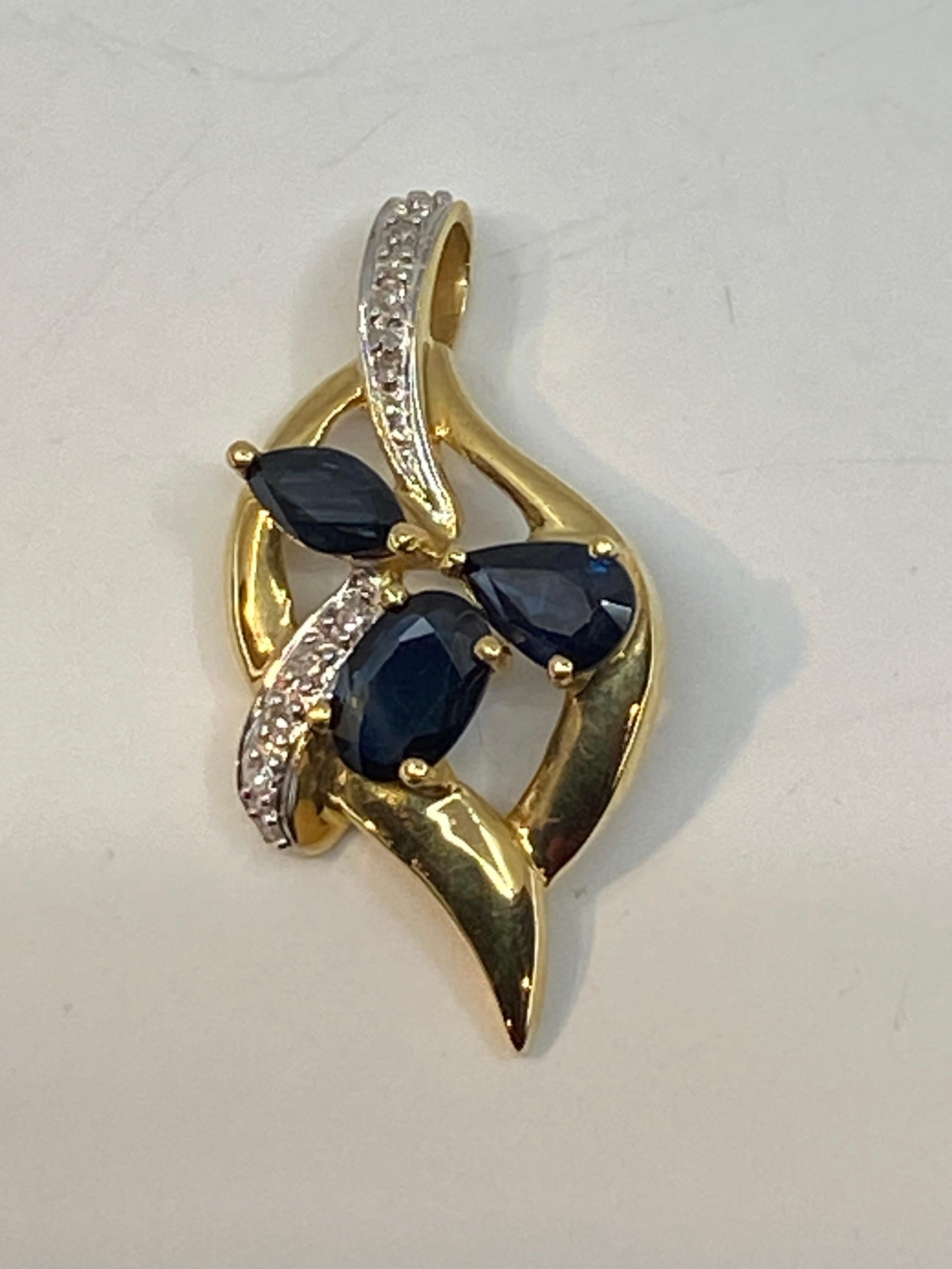Pear Cut 18 Carat Gold Pendant Set with 3 Pear, Shaped Sapphires and 14 Diamonds For Sale