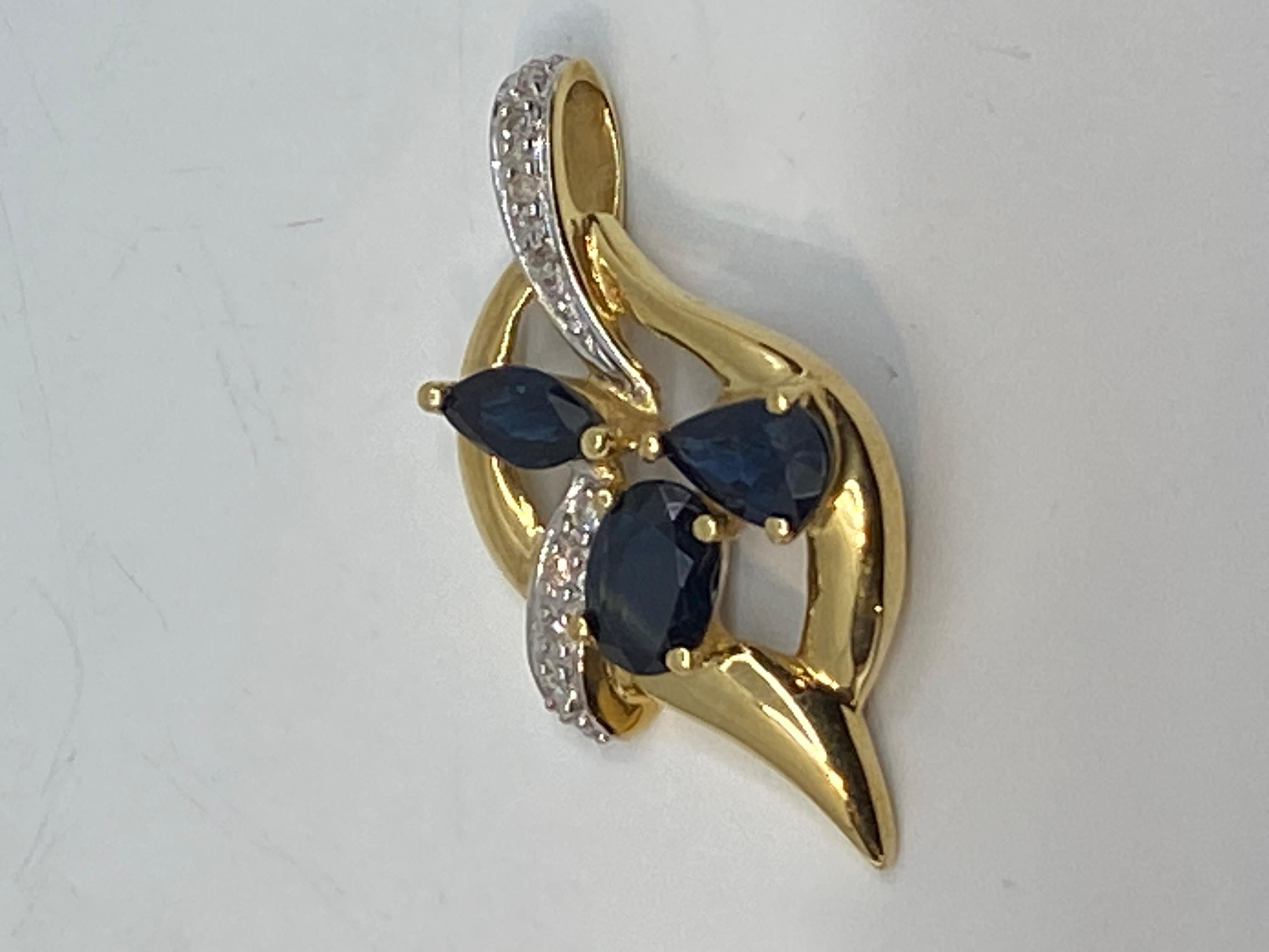 Women's or Men's 18 Carat Gold Pendant Set with 3 Pear, Shaped Sapphires and 14 Diamonds For Sale