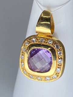 18 Carat Gold Pendant Set with a Faceted Améthyst and Diamonds