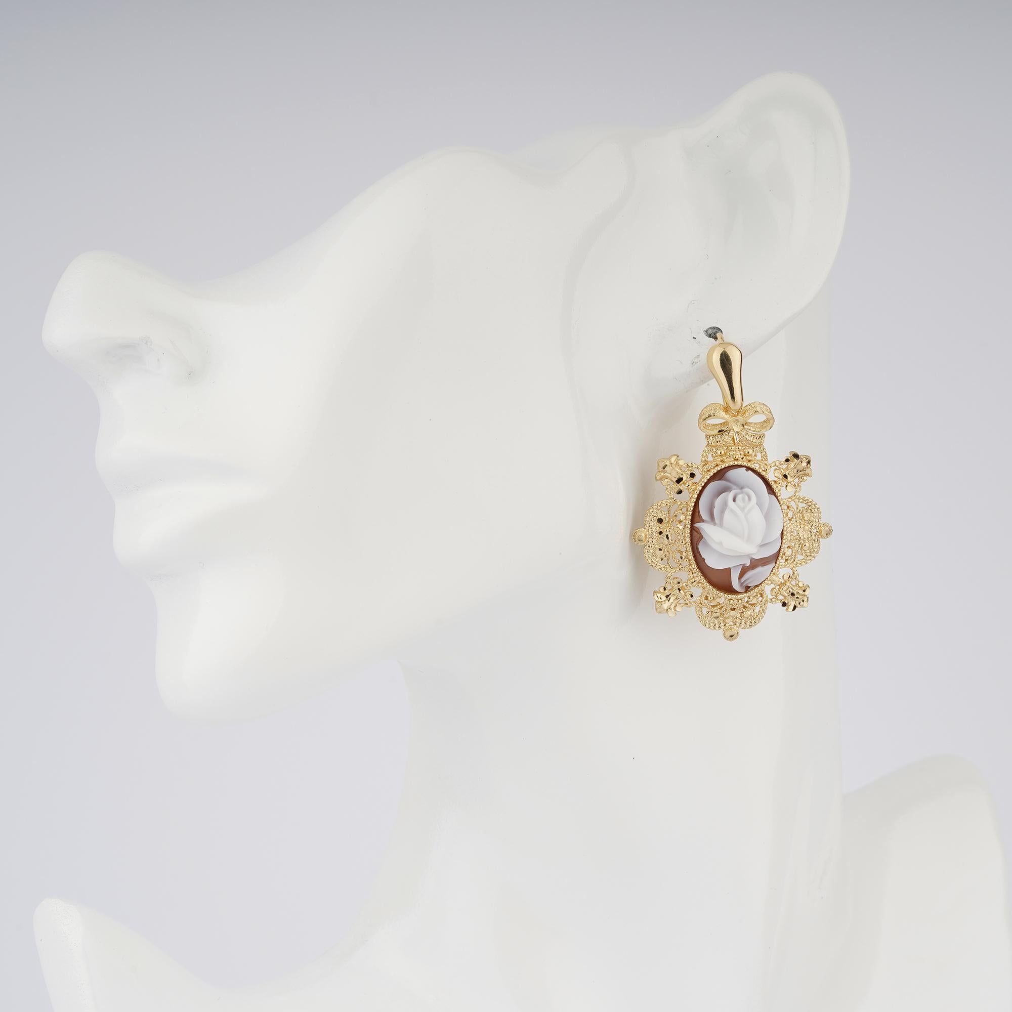 Fully hand-carved roses on a sea shell cameo set in a 18ct Gold plated silver earrings . 

Romantic and easy to wear earrings.

Carvings are performed by our master artisans with generations of experience, all coming from Torre del Greco, Italy -