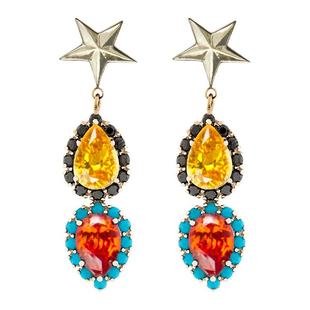 Add Iosselliani’s  aesthetics into your jewelry collection with this gold tone pair of earrings. Embellished with a star, the earrings feature marquise cut multi color zircons for an extra dose of fun. This pair of earrings  are beautifully plated