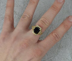18 Carat Gold Rectangular Sapphire and 56 Diamond Cluster Ring