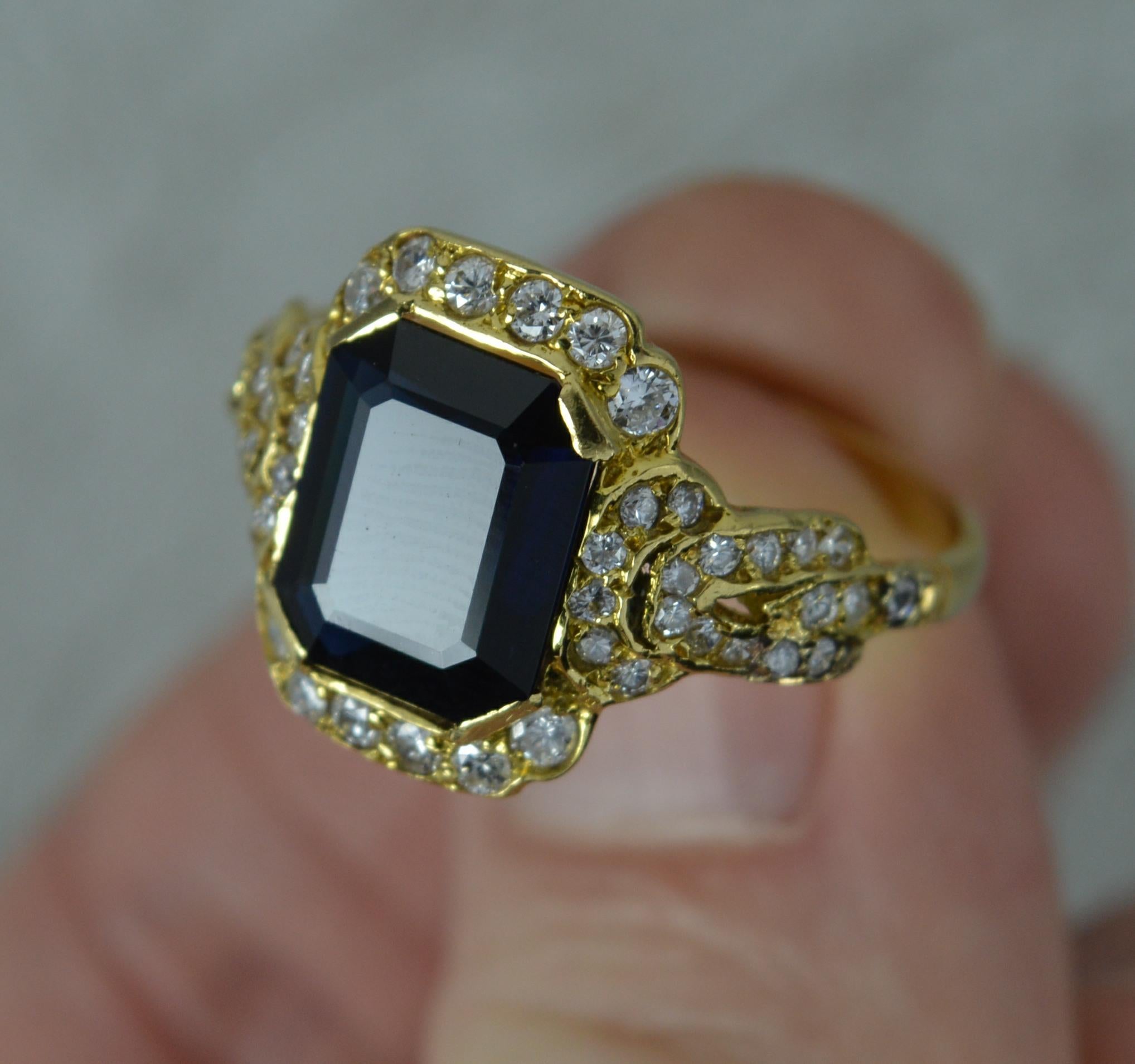 18 Carat Gold Rectangular Sapphire and 56 Diamond Cluster Ring 1