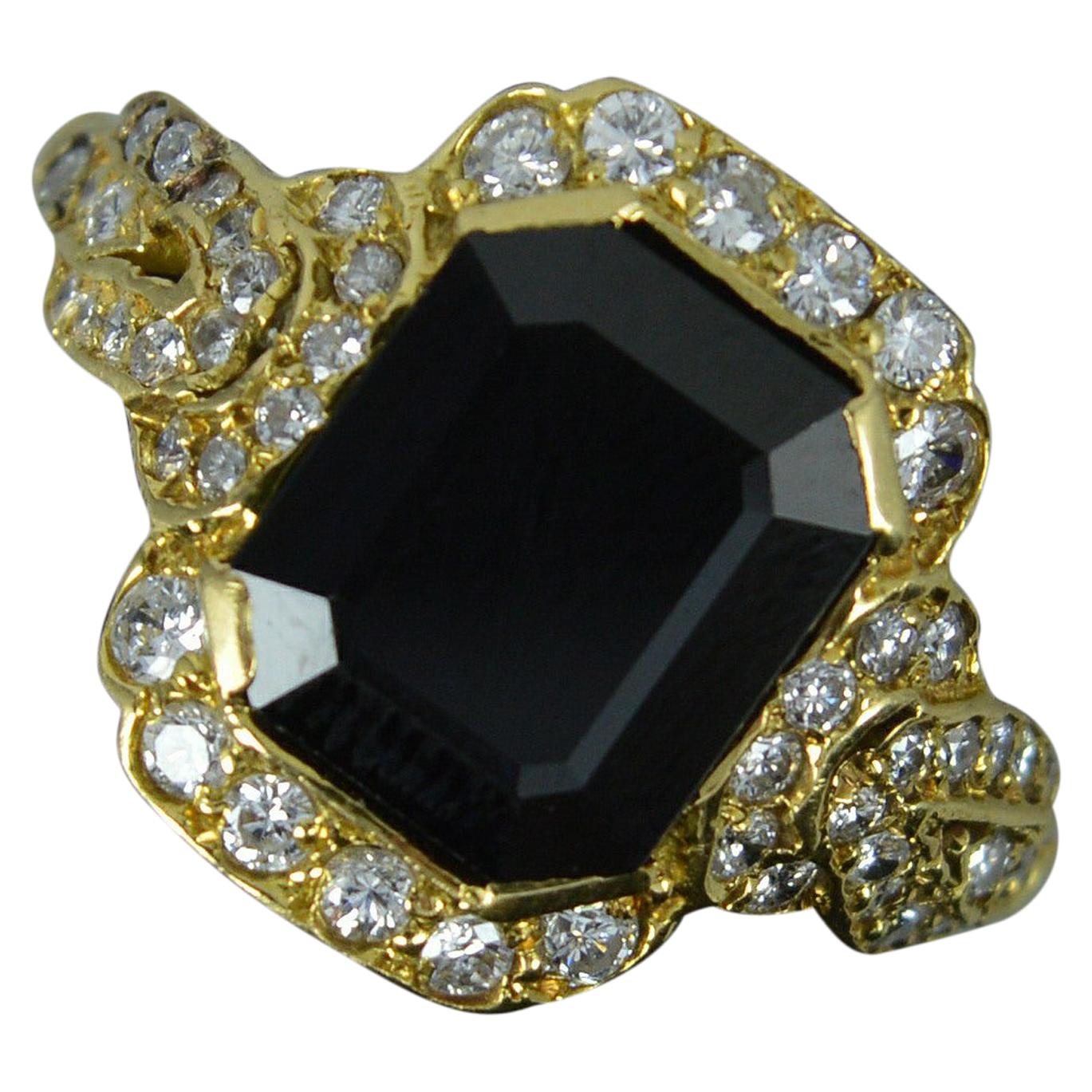 18 Carat Gold Rectangular Sapphire and 56 Diamond Cluster Ring