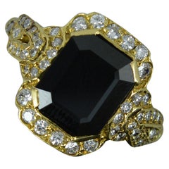 18 Carat Gold Rectangular Sapphire and 56 Diamond Cluster Ring