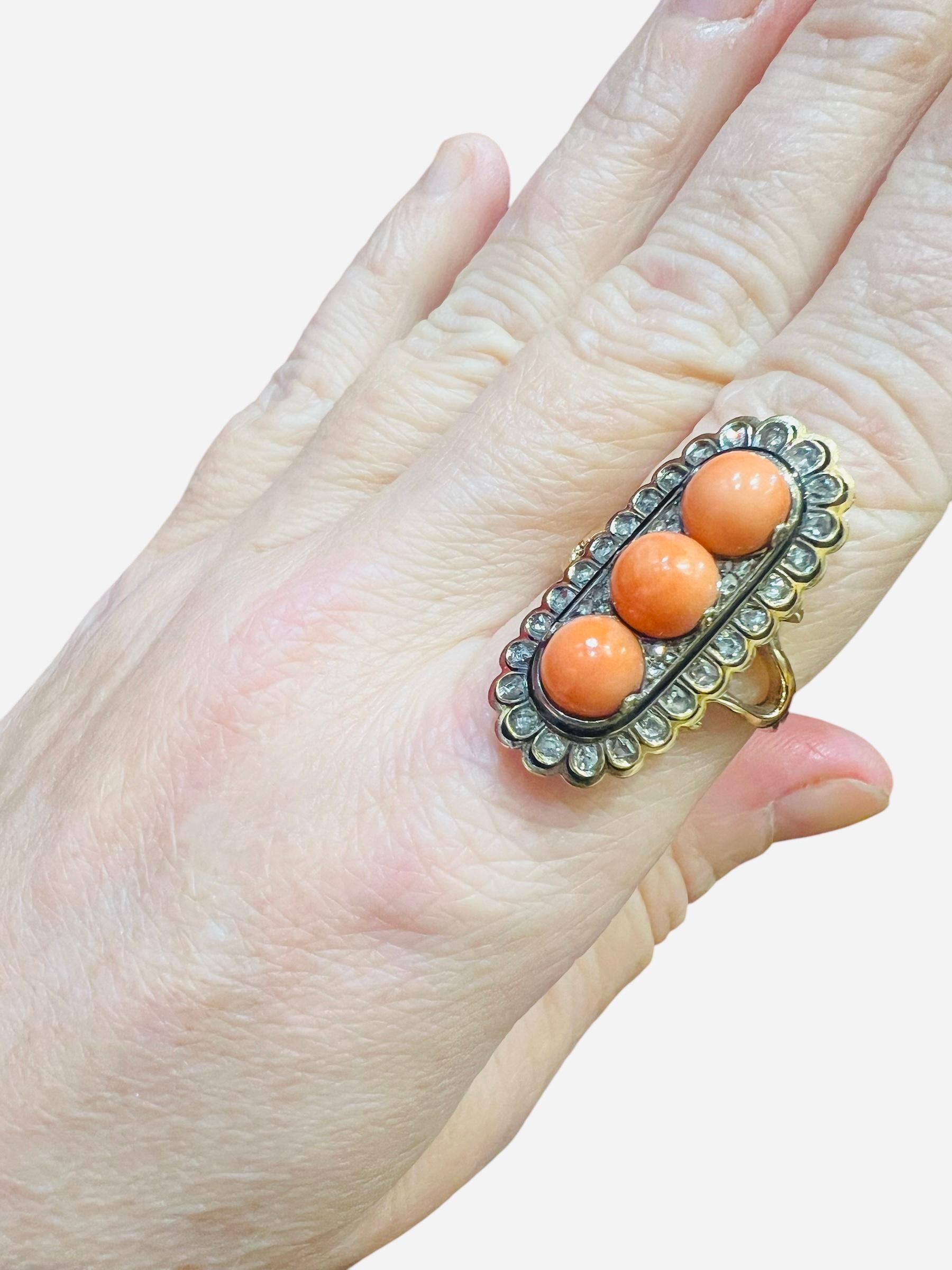 Old European Cut 18 Carat Gold Ring Set With 3 Coral Beads And Antique Cut Diamonds Enhanced With For Sale