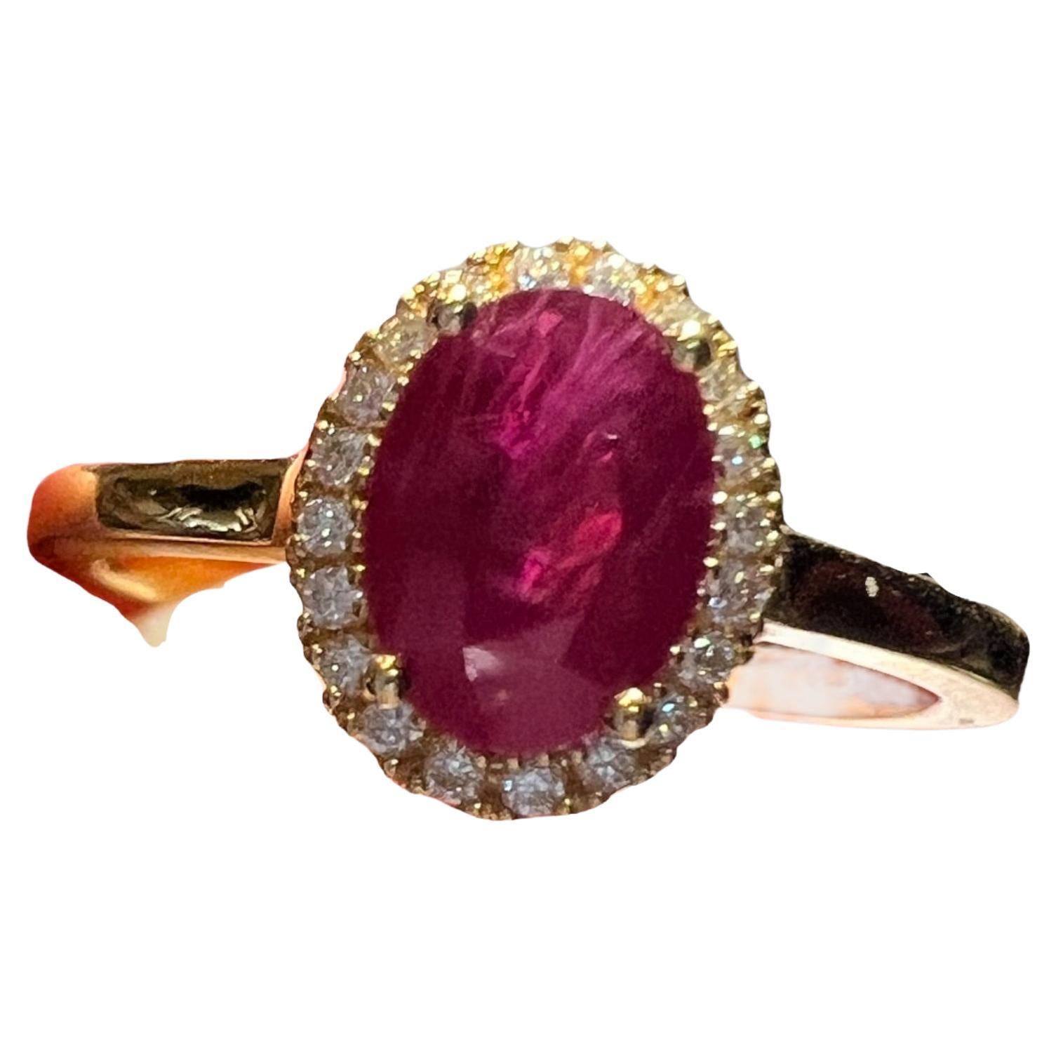 18-Carat Gold Ring, Set with a Ruby in Its Center, Paved with Brilliants