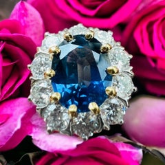 18-Carat Gold Ring Set With A Sapphire Surrounded By Brilliant "Pompadour" Model