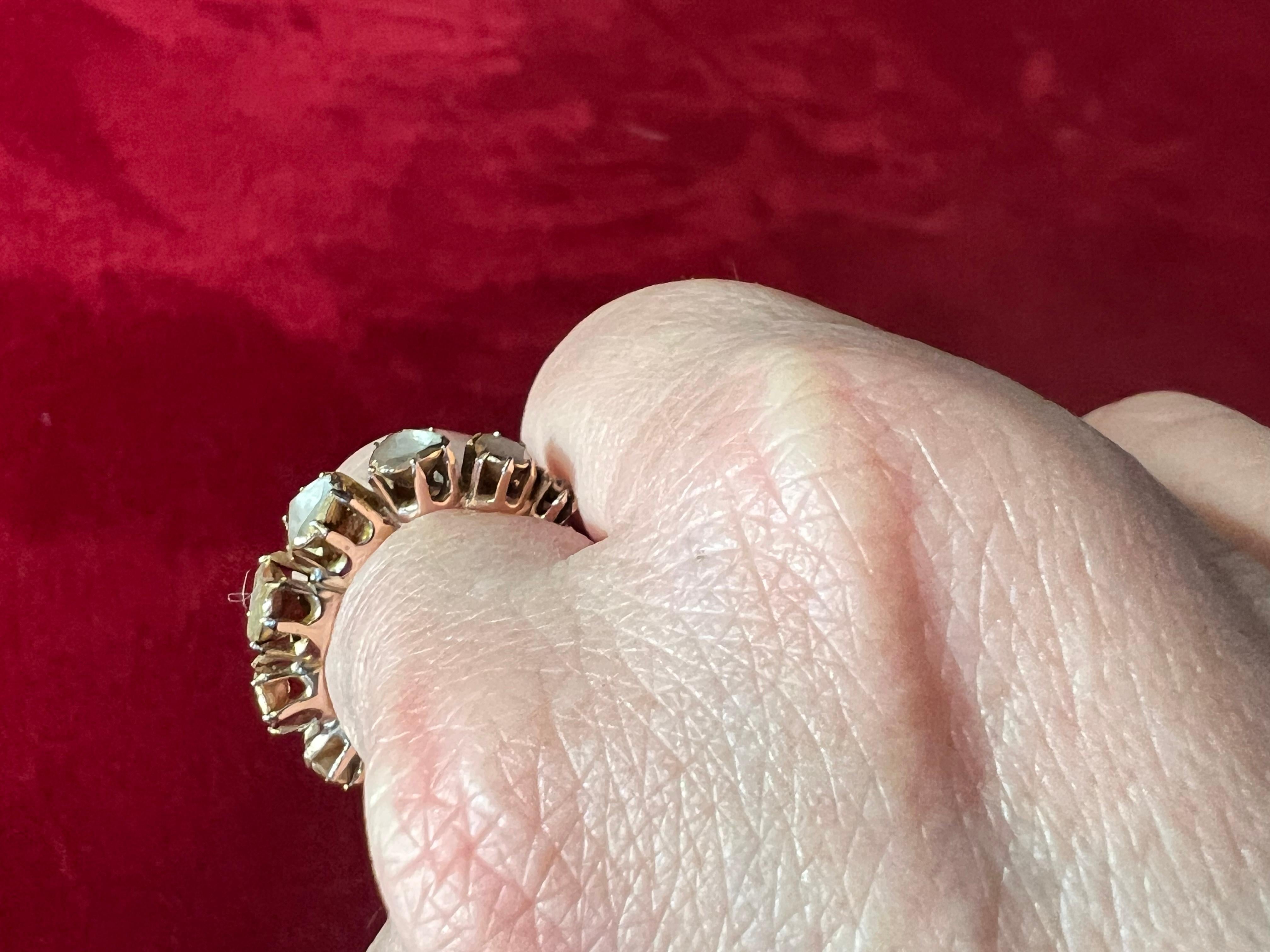 Rose Cut 18 carat gold ring with 7 old cut diamonds 