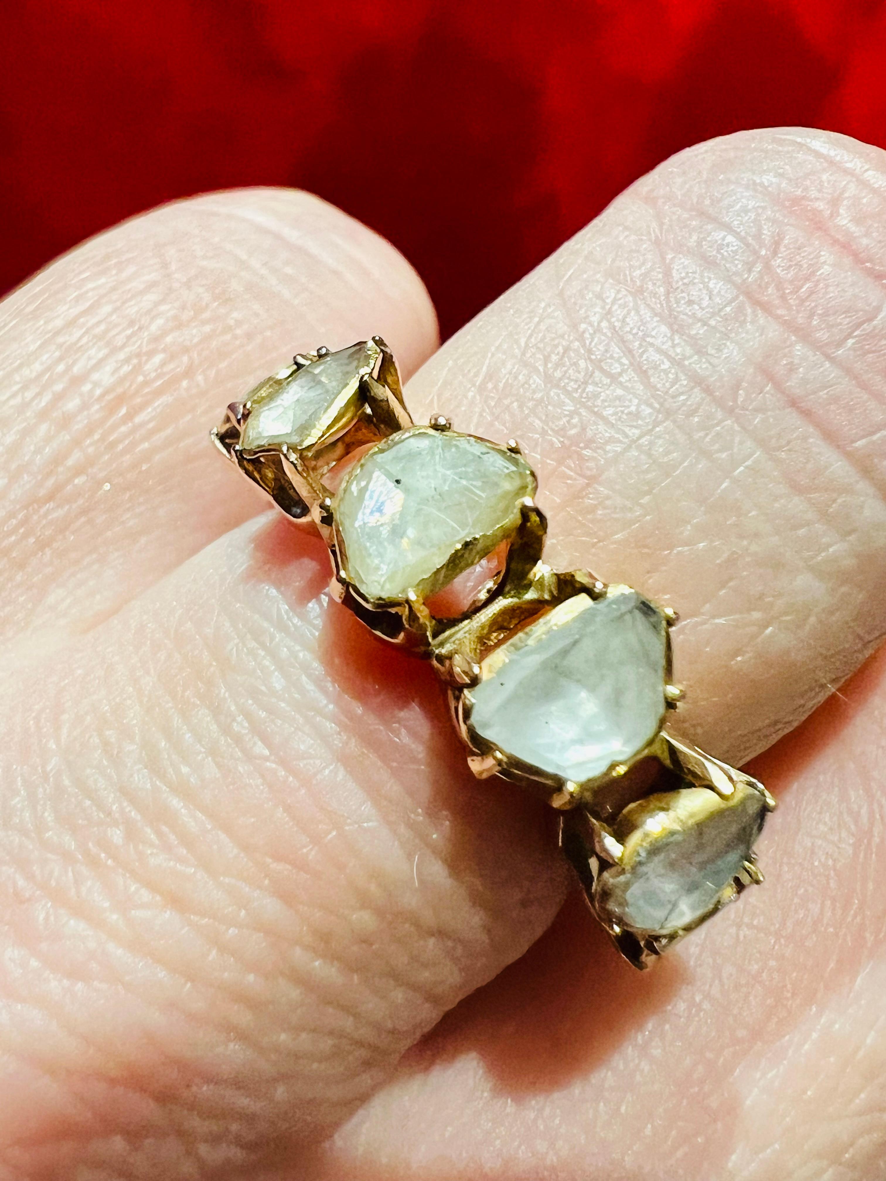18 carat gold ring with 7 old cut diamonds 