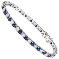 bracelet tennis en or 18 carats:: saphir rond de Ceylan et diamants taille brillant