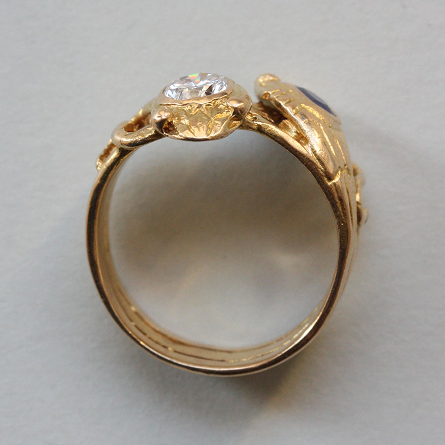 Edwardian 18 Carat Gold Sapphire and Diamond Double Snake Ring