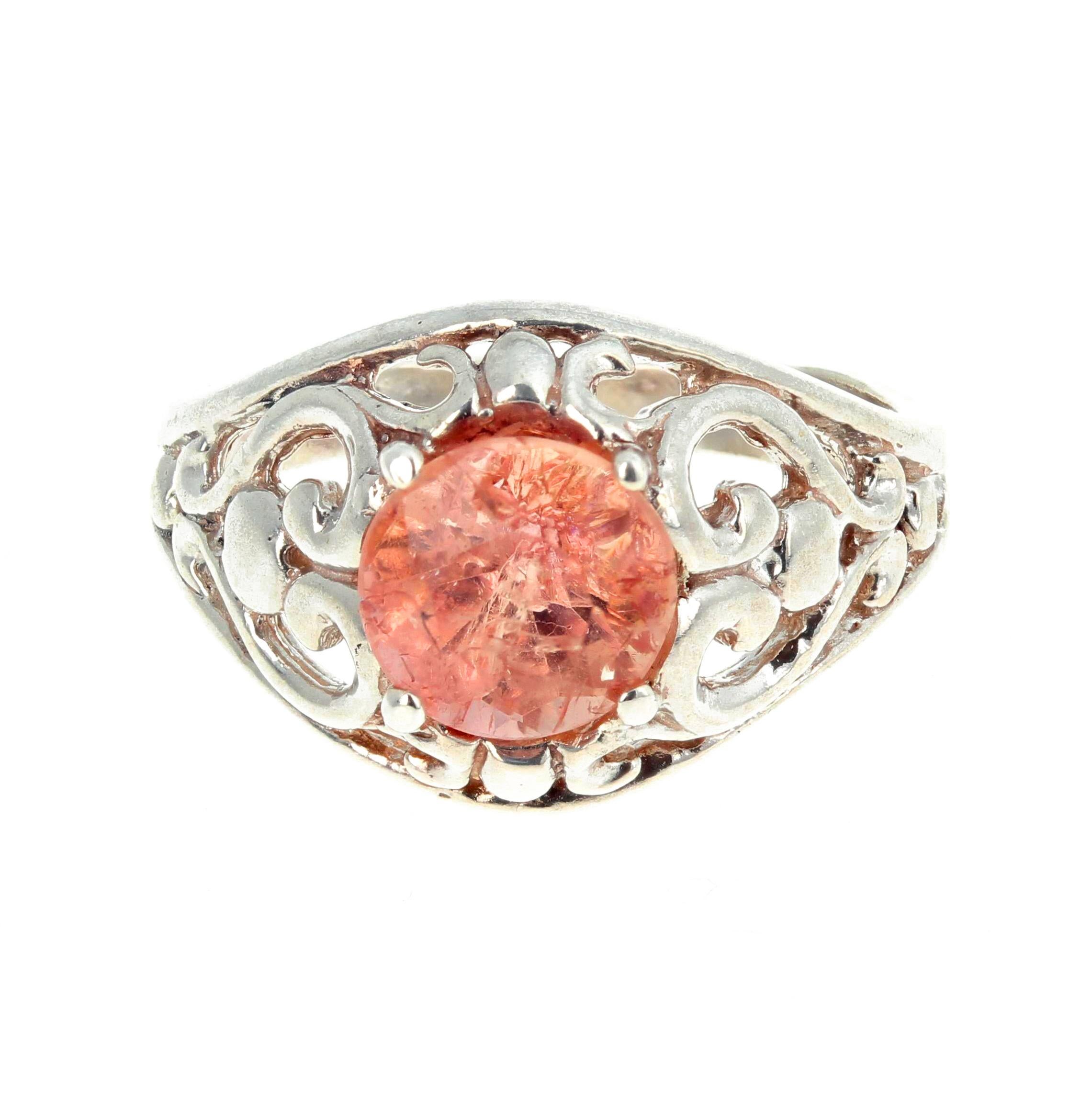 7 mm round brilliant sparkling natural apricot/pinky uniquely rare Imperial Topaz set in a sterling silver handmade ring size 6 (easily sizable).  This is much prettier than its picture and its natural inclusions make it sparkle more..   More from