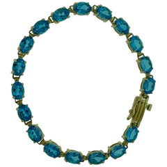 18 Carat Natural Blue Topaz Tennis Bracelet 14 Karat Yellow Gold Very Affordable