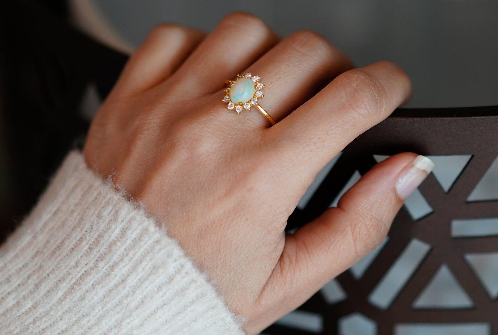 This Diamond Opal Engagement Ring is beautifully made with high-quality diamonds, it's perfect for wedding, engagement, or anniversary gift. This artisan handcrafted ring is one of a kind beauty that can be adorned with any dress and on any