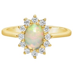 18 Carat Opal Engagement Ring with High Quality Diamonds