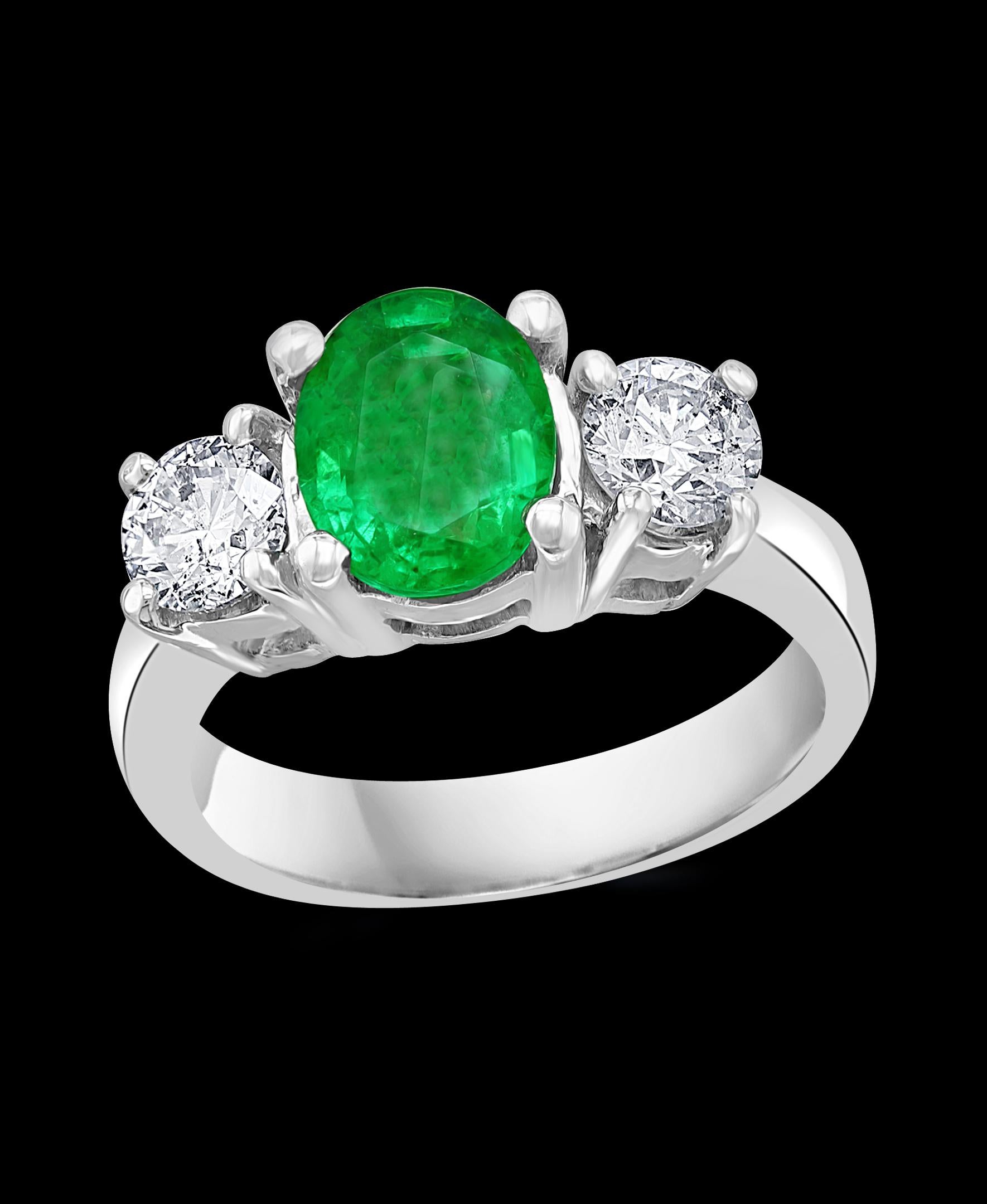 
1.8 Carat Oval Cut  Emerald & 0.90 Ct Diamond Ring In Platinum
A Classic, ring 
1.8 Carat exact weight   Emerald Absolutely gorgeous emerald , Very desirable  but  in color , Extreme fine quality ,color and luster
Clarity is very nice but has black