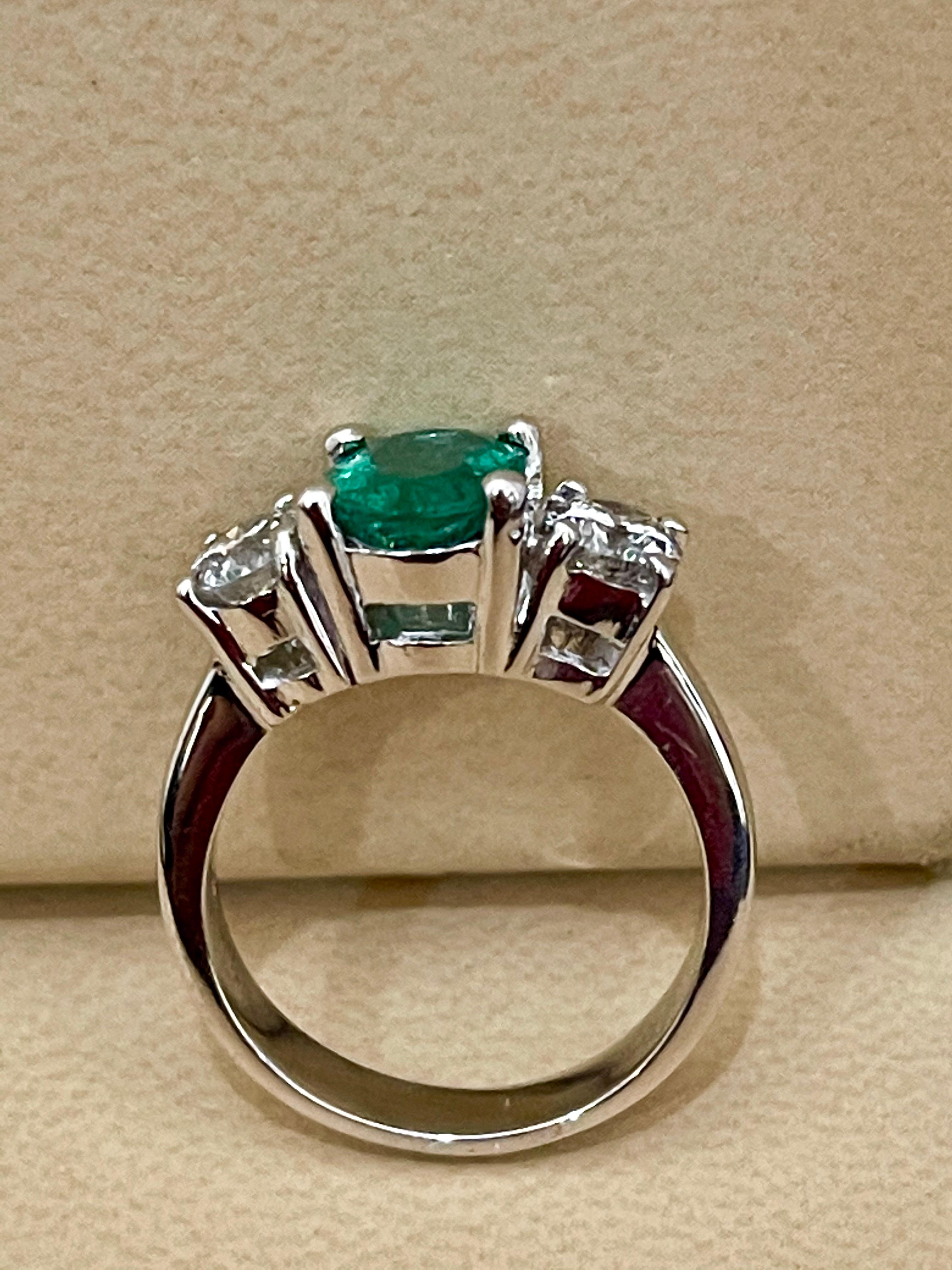 1.8 Carat Oval Cut Emerald & 0.90 Ct Diamond Ring in Platinum In Excellent Condition In New York, NY