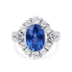 1.8 Carat Oval Halo Diamond Ring Royal Blue Sapphire 18K Gold Elegant Sparkle