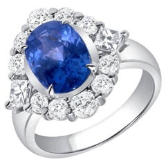 1.8 Carat Oval Halo Diamond Ring Royal Blue Sapphire 18K Gold Elegant Sparkle