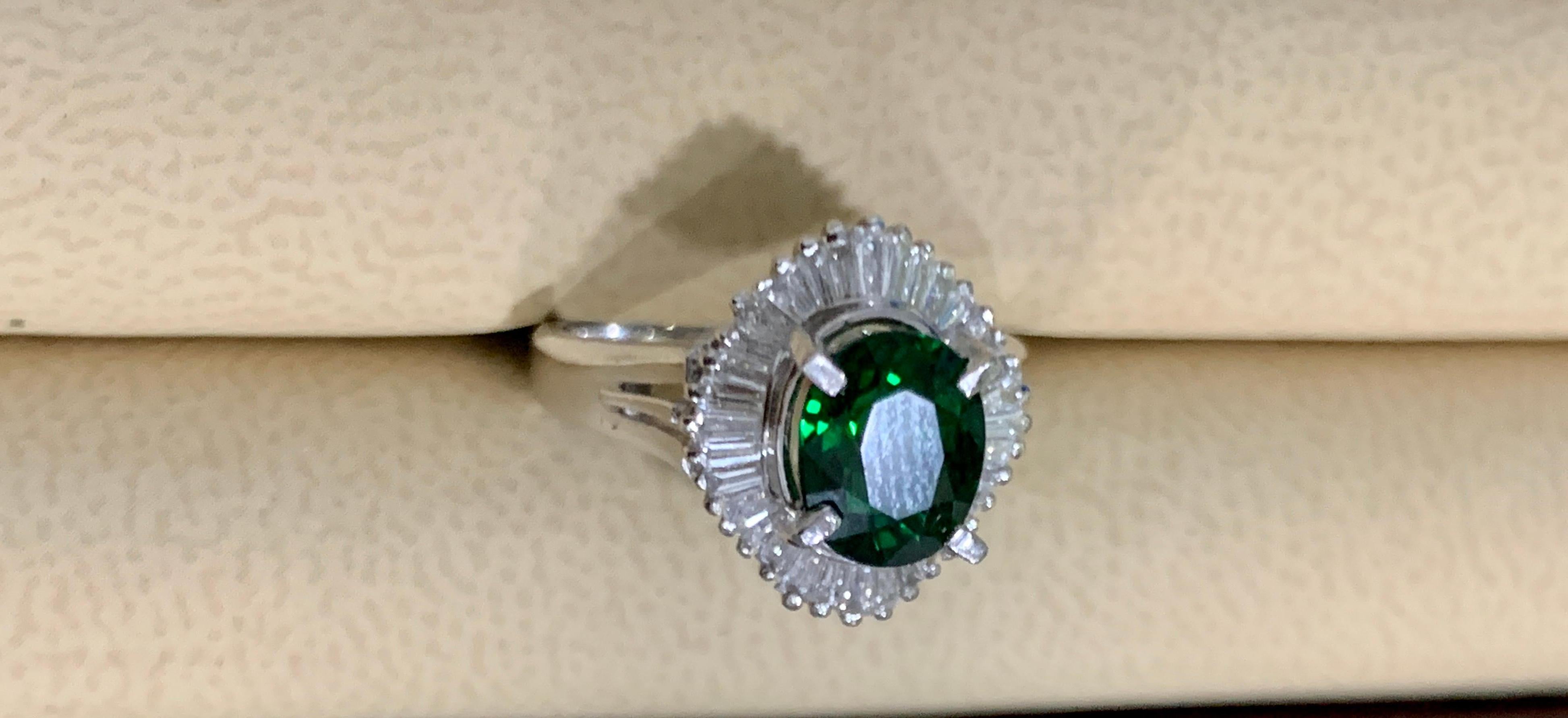 1.8 Carat Oval Tsavorite and 1.0 Carat Diamond Ring in Platinum Estate Size 6 For Sale 3