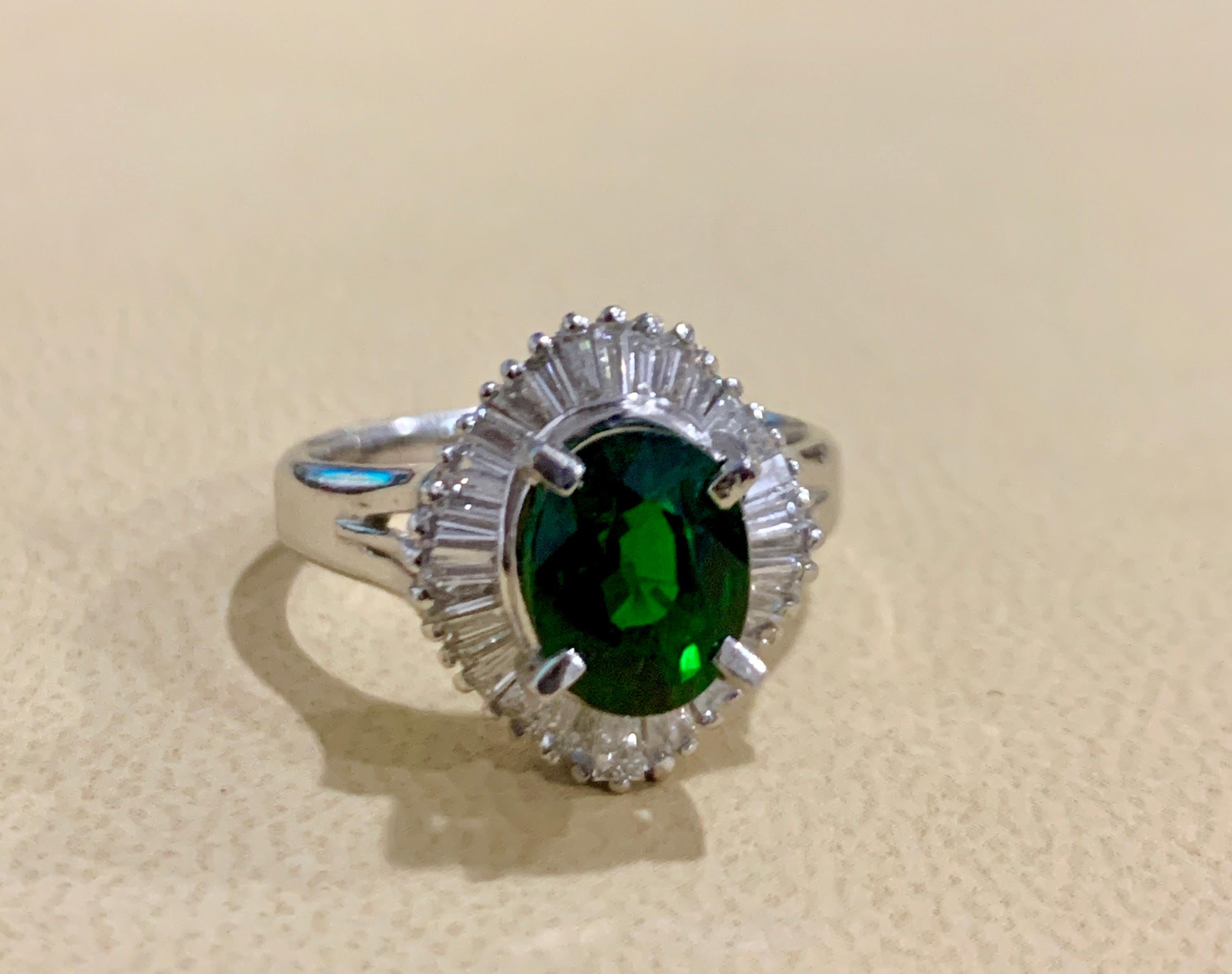 Oval Cut 1.8 Carat Oval Tsavorite and 1.0 Carat Diamond Ring in Platinum Estate Size 6 For Sale