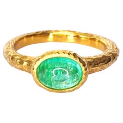 Anello con tormalina Paraiba cabochon da 1,8 carati in oro giallo 18 carati
