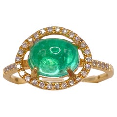 1.8 Carat Paraiba Tourmaline Cabochon and Diamonds Ring