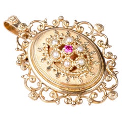 18 carat pink gold brooch or/and ruby and pearls pendant