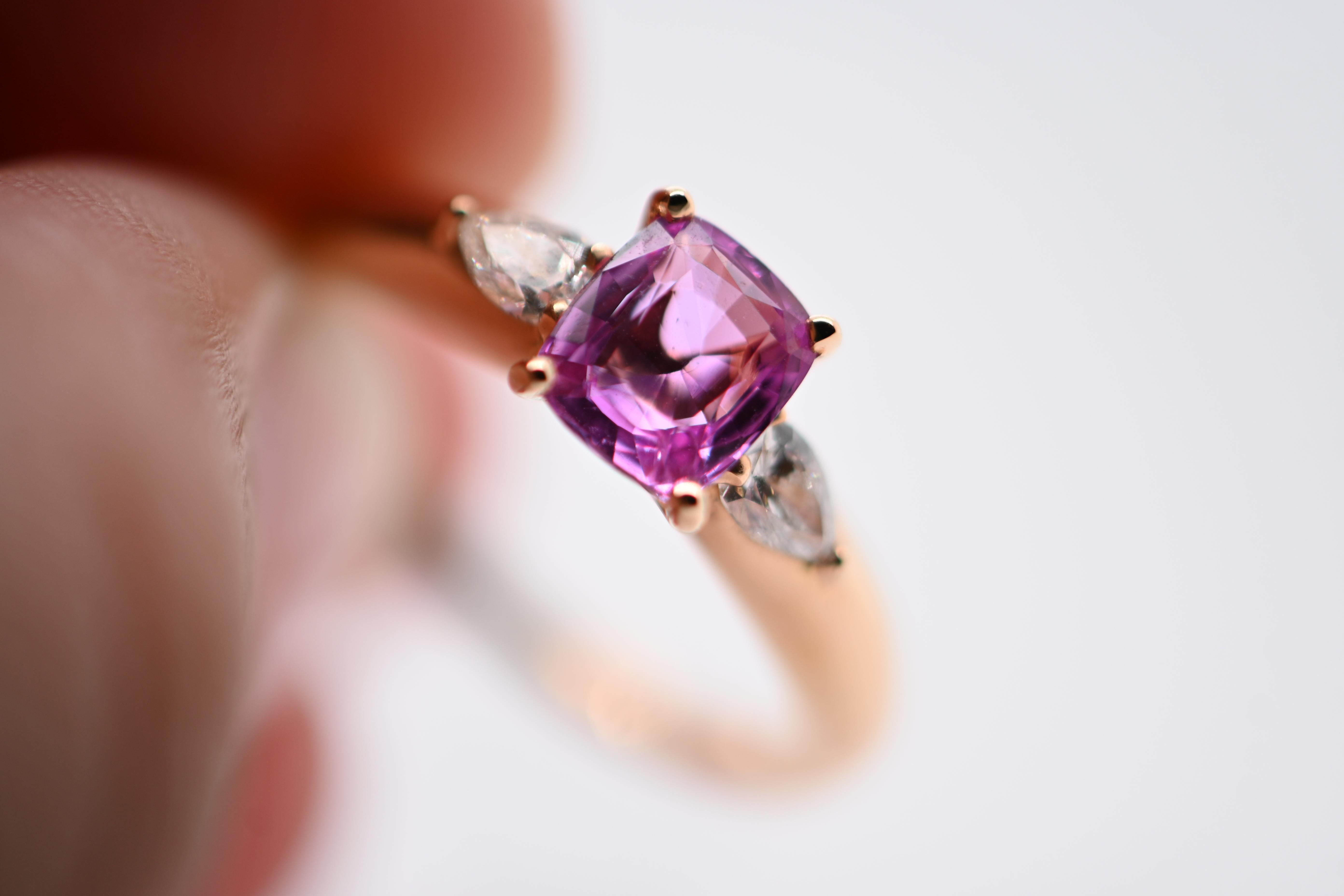Radiant Cut 18-Carat Pink Gold Ring with Pink Sapphire and Two Diamonds Totaling 1.07 Carat For Sale
