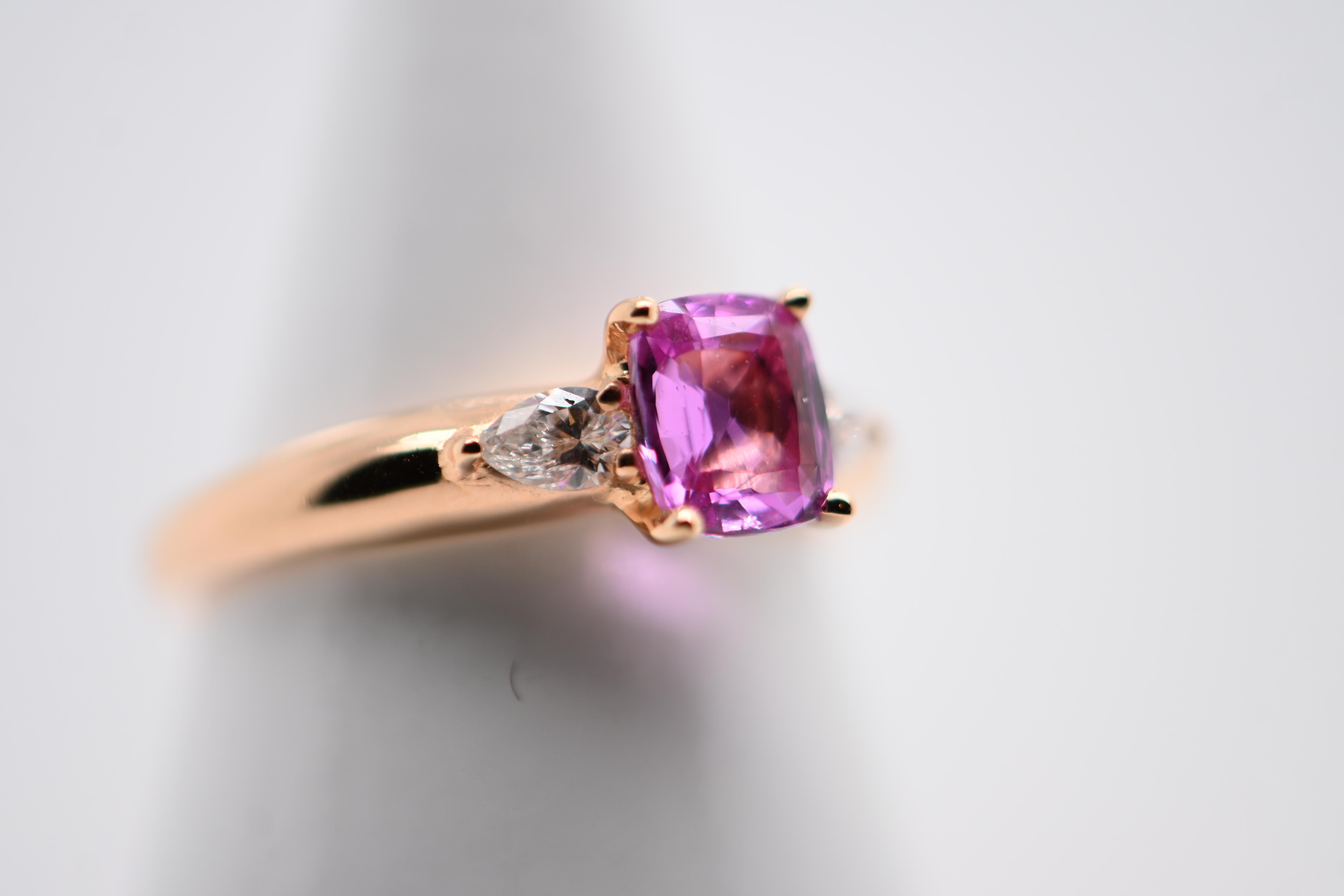Women's 18-Carat Pink Gold Ring with Pink Sapphire and Two Diamonds Totaling 1.07 Carat For Sale