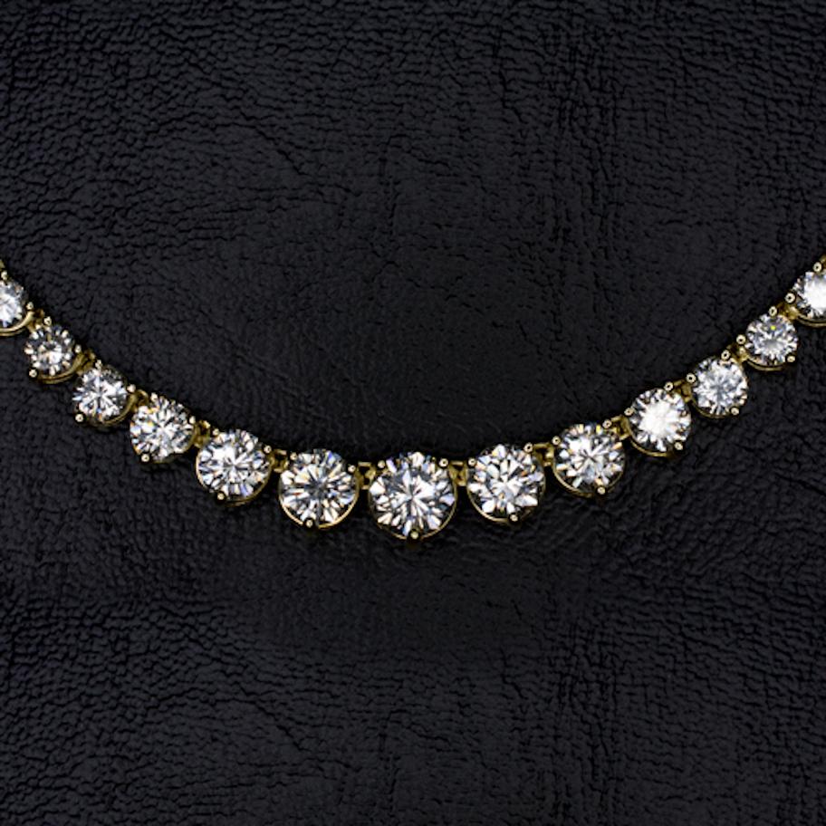 Riviera necklace with 18 carats of high quality diamonds! This is quite a fantastic piece that is beaming with brilliance and luxury! The sizes and quality is incredible and is certainly above average compared to most necklaces. Ninety-one round