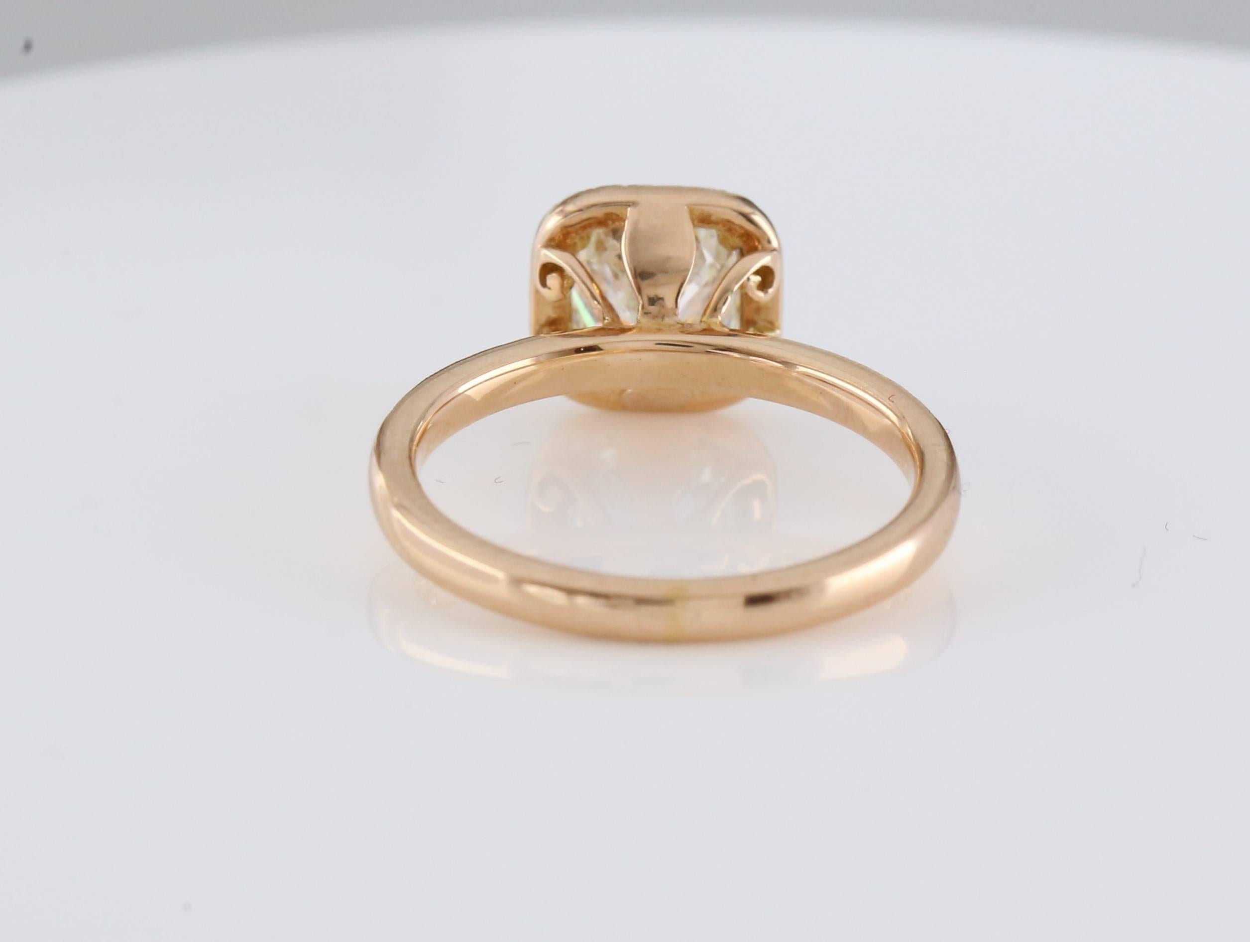 18ct Rose/red gold diamond halo ring, Centre diamond 1.01ct Cushion Cut, Colour I, Clarity VS2, Set in a halo of 36 x round brilliant diamonds, Carat weight 0.18ct total F-G colour and VS Clarity.
Hallmarked 750 weighs 2.99g handmade.
WGI