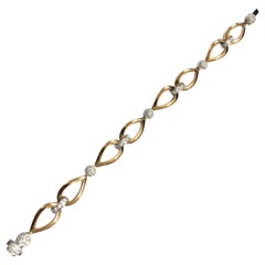 18 Carat Rose and White Gold Diamond Chain Bracelet